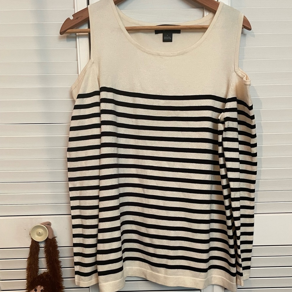 Ivory with black stripes cold shoulder sweater size L.